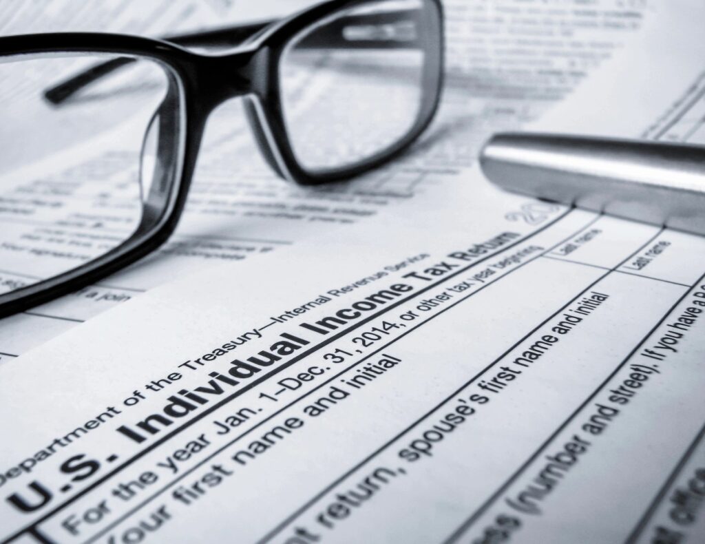 Individual tax return forms are shown in the frequently asked questions.